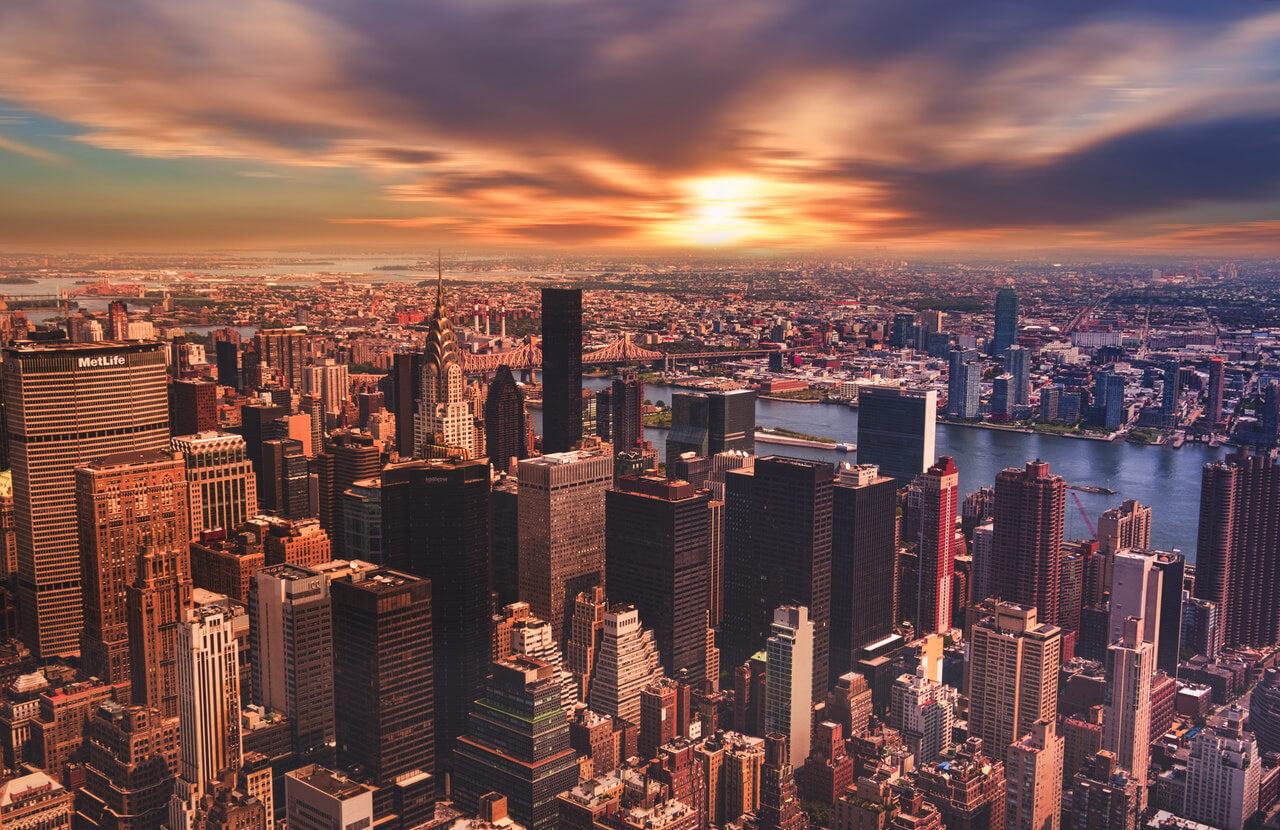 high-angle-view-of-cityscape-against-cloudy-sky